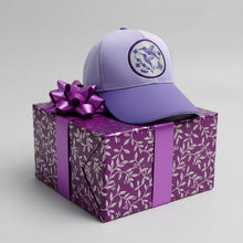 Load image into Gallery viewer, A purple adjustable water-repellent cap with a hummingbird design on the front.