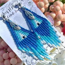 Load image into Gallery viewer, Mocs N More Earrings - Blue Sky Feather Dangle