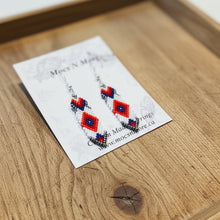 Load image into Gallery viewer, Pair of beaded earrings on a Mocs N More branded card.