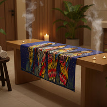 Load image into Gallery viewer, oversized bath towel with an indigenous art design of four woman 

