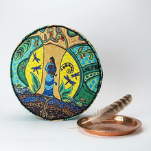 Load image into Gallery viewer, Colorful circular pillow with intricate patterns on a white background