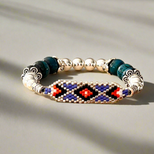 Load image into Gallery viewer, Beaded bracelet with geometric pattern on a light background