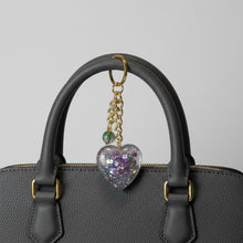 Load image into Gallery viewer, Mocs N More - Glitter Heart Keychain with Purple &amp; Green Glass Bead Charm
