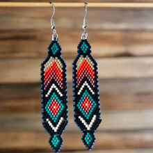 Load image into Gallery viewer, Beaded earrings with geometric pattern on a wooden background