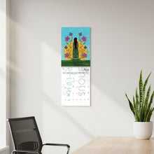Load image into Gallery viewer, Calendar with a colorful design of a woman surrounded by flowers on a white background