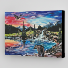 Load image into Gallery viewer, Canvas print of a mountain landscape with a bear, bird, and waterfall on a white wall.