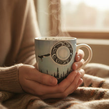 Load image into Gallery viewer, Ceramic mug with artistic design on a textured surface