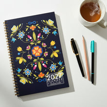 Load image into Gallery viewer, 2023 planner with colorful floral design on a textured surface