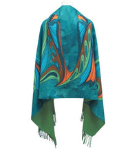 Load image into Gallery viewer, A teal and green patterned shawl with orange and blue abstract swirls, displayed on a white hanger against a white background.