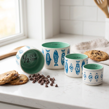 Load image into Gallery viewer, Baking-style photo of the Salmon in the Wild measuring cups