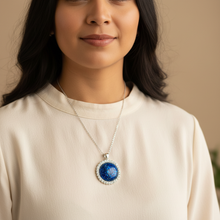 Load image into Gallery viewer, Courage Pendant on Indigenous model - cream blouse