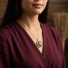 Load image into Gallery viewer, Daring Pendant on Indigenous model - burgundy blouse