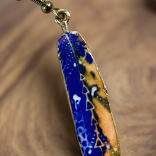 Load image into Gallery viewer, Extreme close-up of brass feather detail