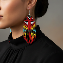 Load image into Gallery viewer, Fancy Dancer Earrings close-up - black blouse