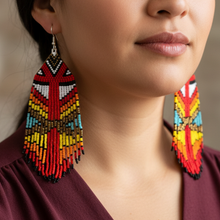 Load image into Gallery viewer, Fancy Dancer Earrings close-up - burgundy blouse