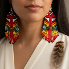 Load image into Gallery viewer, Fancy Dancer Earrings close-up - cream blouse