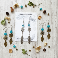 Load image into Gallery viewer, Flat lay showing both earrings