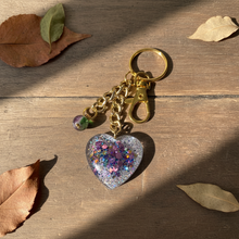 Load image into Gallery viewer, Mocs N More - Glitter Heart Keychain with Purple &amp; Green Glass Bead Charm
