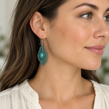 Load image into Gallery viewer, Turquoise Willow Leaf Earring worn with a cream blouse