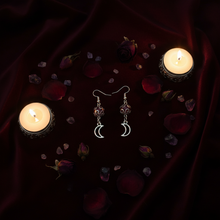 Load image into Gallery viewer, Crimson Moon Dangle Earrings moody flat lay