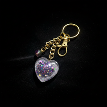 Load image into Gallery viewer, Mocs N More - Glitter Heart Keychain with Purple &amp; Green Glass Bead Charm