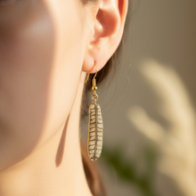 Load image into Gallery viewer, Macro close-up of Vision Quest Feather Earrings from angle