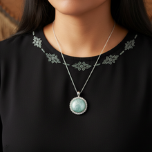 Load image into Gallery viewer, Majestic Pendant on Indigenous model - black blouse