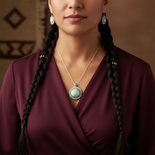 Load image into Gallery viewer, Majestic Pendant on Indigenous model - burgundy blouse