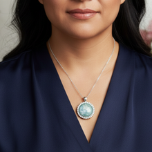 Load image into Gallery viewer, Majestic Pendant on Indigenous model - navy blue blouse