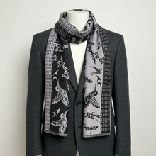 Load image into Gallery viewer, Reversible scarf on dark grey jacket