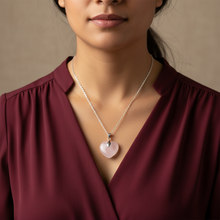 Load image into Gallery viewer, Rose Quartz Heart close-up - burgundy blouse