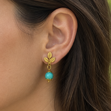 Load image into Gallery viewer, Three-leaf sprig earrings lifestyle image