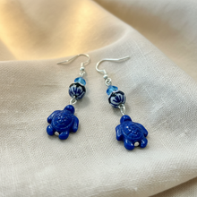 Load image into Gallery viewer, Turtle Earrings on Cotton Cloth